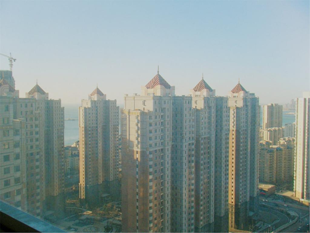 Xinghai Zhilian Apartment Далянь Екстер'єр фото